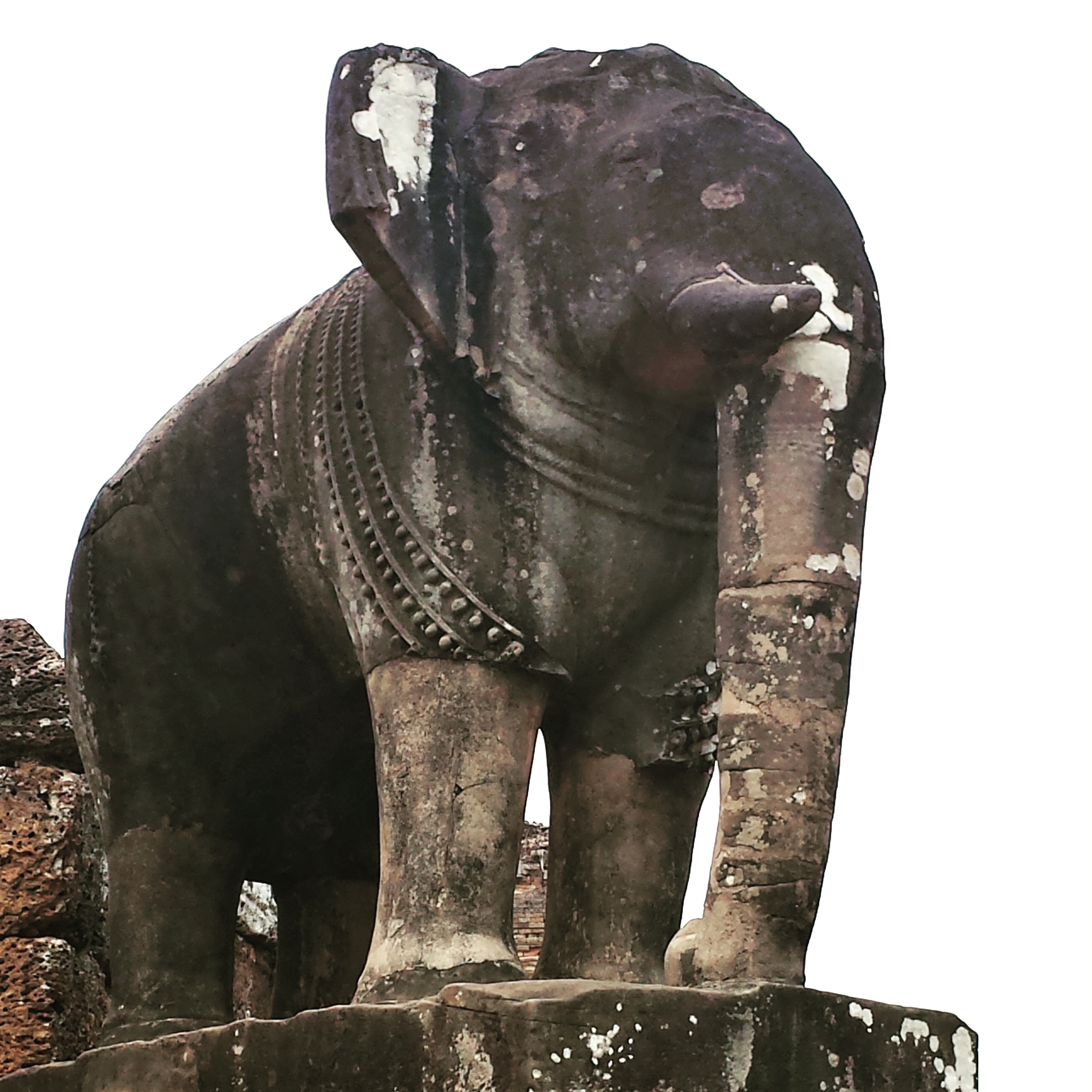 Stone statue of an elephant at Ta Prohm temple in Cambodia